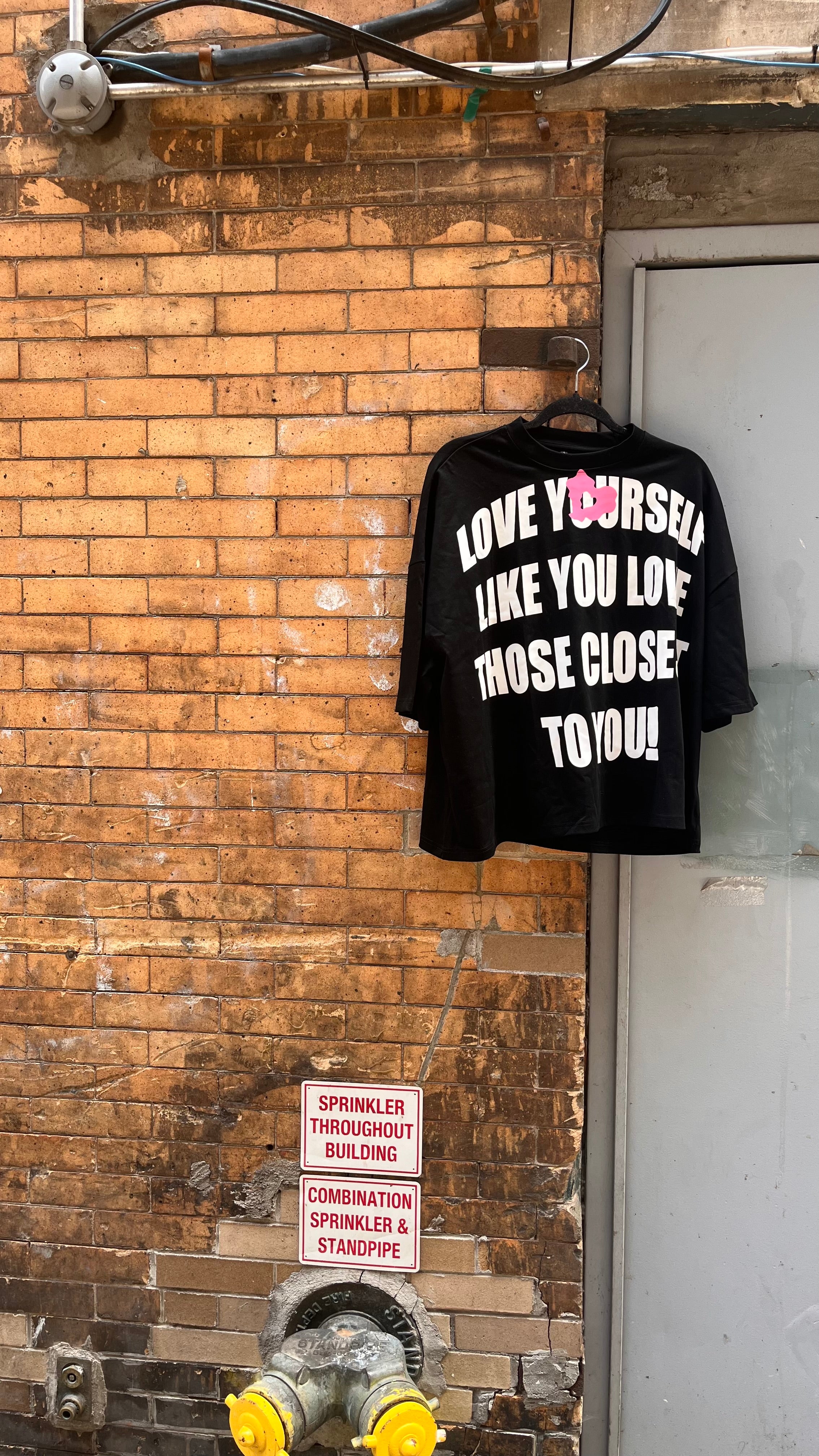 Black “Love Yourself” tee